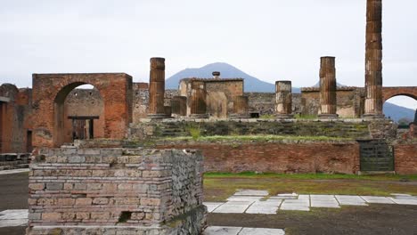 ruins of famous pompeii city, italy.temple of aesculapius or jupiter meilichios