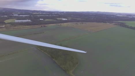 aerial view of wind turbine - renewable energy by wind power