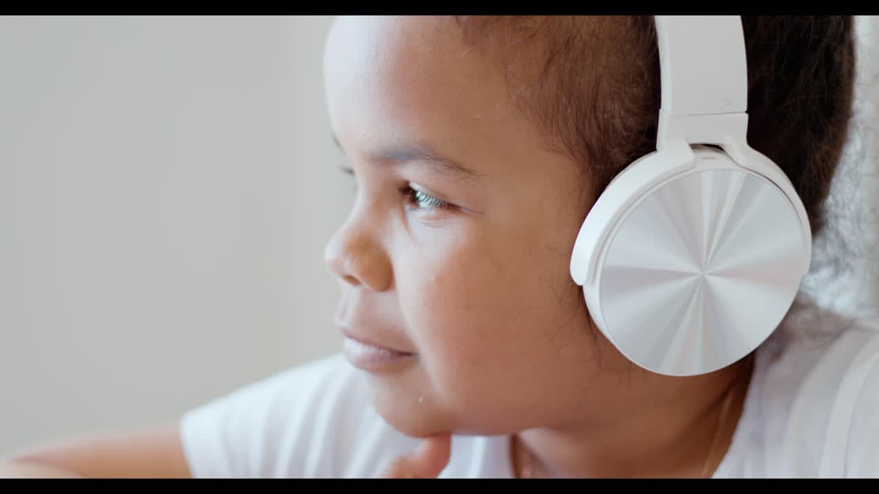 Girl Listening to Music and Studying