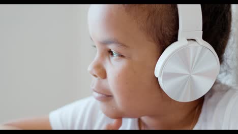 girl listening to music and studying