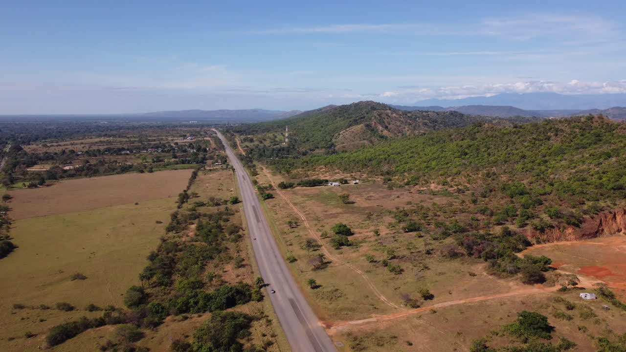 A road winding its way back into the heart of the Venezuelan countryside