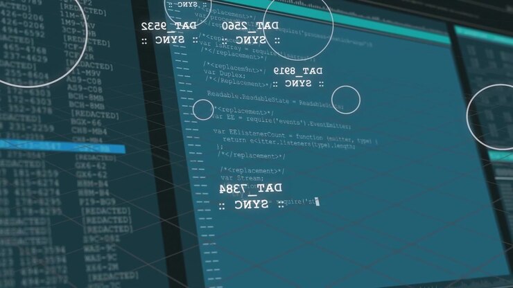 Camera shifting forward, monitor revealing technology code editor, HUD rings showing live edits