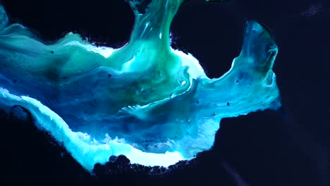 Deep-deep-within-the-earth-a-hidden-cave-glows-with-surging-blue-waters--an-all-natural-AbstractVideoClip