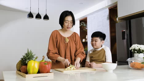 Woman-cutting-bananas.