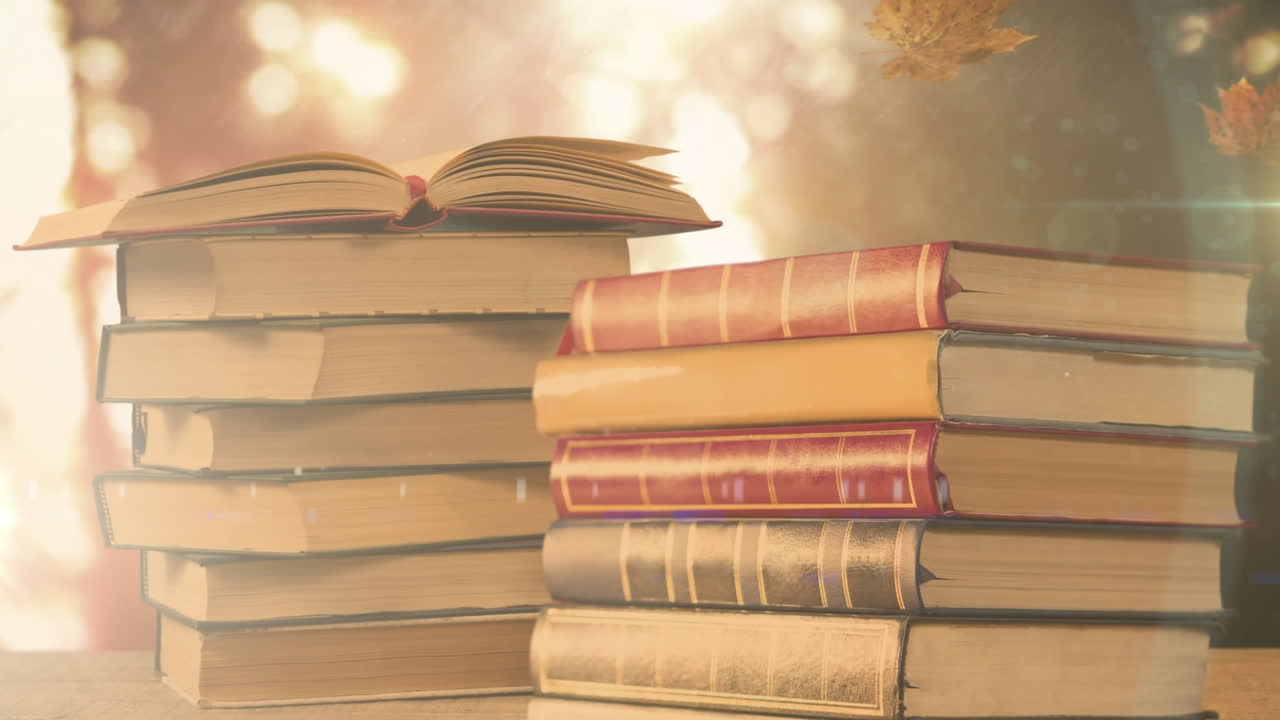 animación de una pila de libros con hojas de otoño cayendo sobre luces brillantes