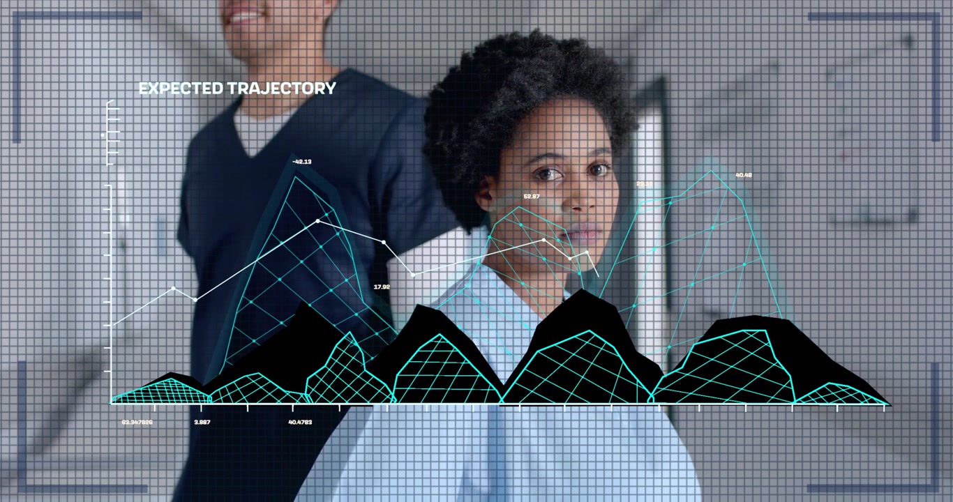 Infirmière dans un couloir initiant une superposition de données pour suivre les mouvements du personnel via l'analyse prédictive.