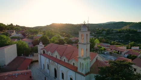 Aerial-of-Lofou-village-in-Troodos-Mountains,-Cyprus,-during-sunset