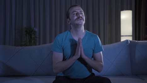 European-Christian-man-praying-at-night.