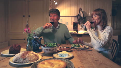 happy couple drinking red wine together