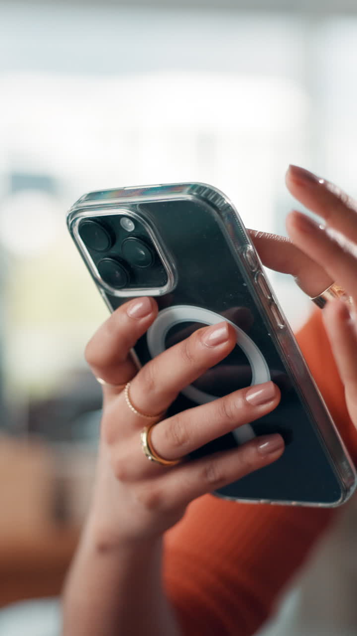 Close-up of Hands Scrolling and Tapping on a Smartphone