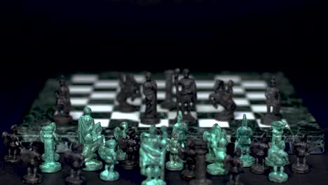 ancient marble chessboard with teal bronce knights as pawns slider macro-3