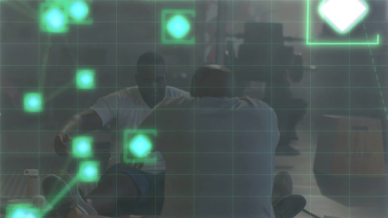 Two men responding to intensifying neon AR grid on floor, reaching and connecting data nodes