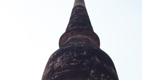 visitors ascend ancient temple steps in ayutthaya