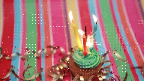 Digital-animation-of-dots-pattern-design-and-confetti-falling-over-burning-candles-on-a-cupcake