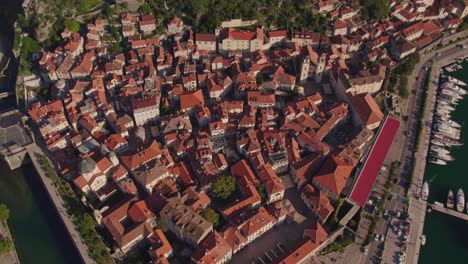 Above-old-medieval-town-Kotor-of-Montenegro-in-afternoon,-touristic-destination