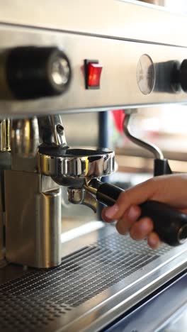 barista making coffee