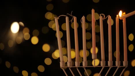 encender las velas de la menorá vacaciones de hanukkah en la noche de srael 4k