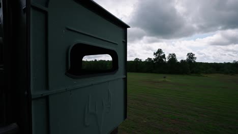 side exterior of deer stand on a big food plot