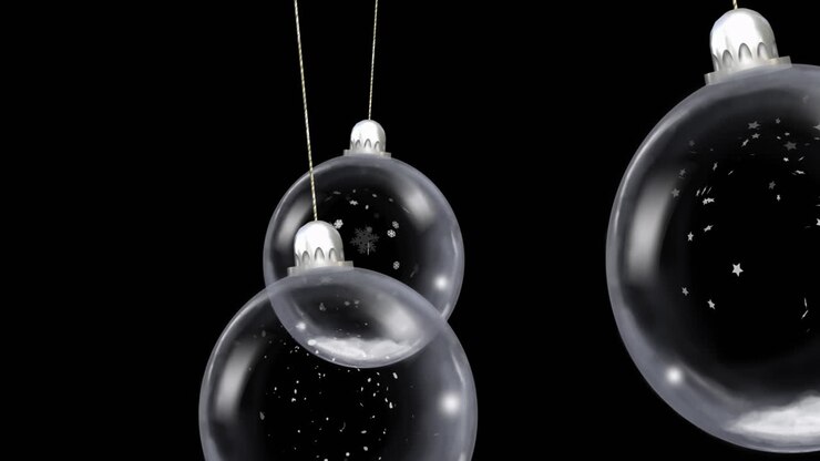 Animation of christmas baubles dangling with snow falling on black background