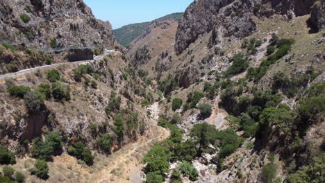 topoliana gorge in crete, aerial drone view revealing valley, summer