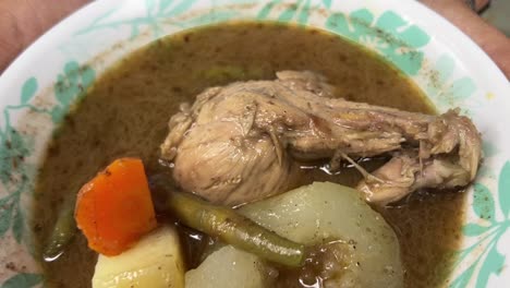 traditional chicken stew for footballer prepared in a bengali restaurant