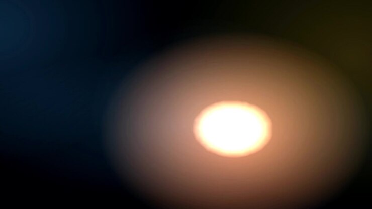 Sfondo astratto con sfere di luce soffusa blu e arancione