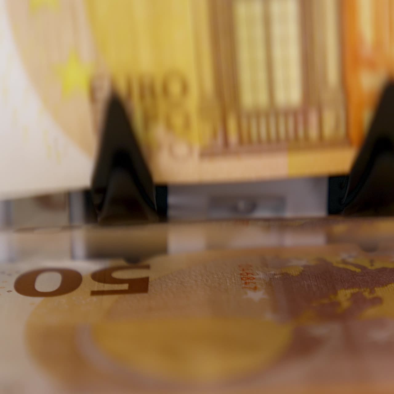 Machine for counting money. Euros banknotes. Finance concept. Mechanism for bank financial operations