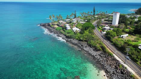 Aerial-over-Waimea-beach-and-palm-trees,-Oahu,-Hawaii