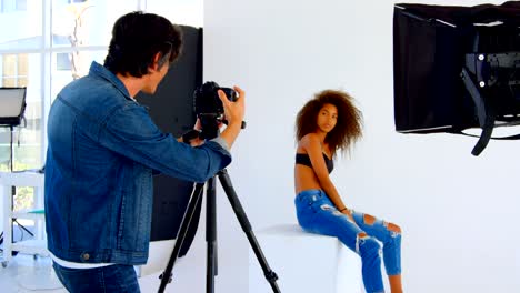 female model posing for a photoshoot in the studio 4k