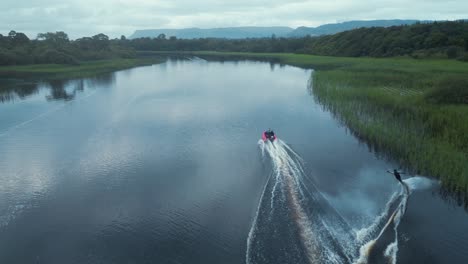 slalom water skier freeskiing then falling ascending aerial