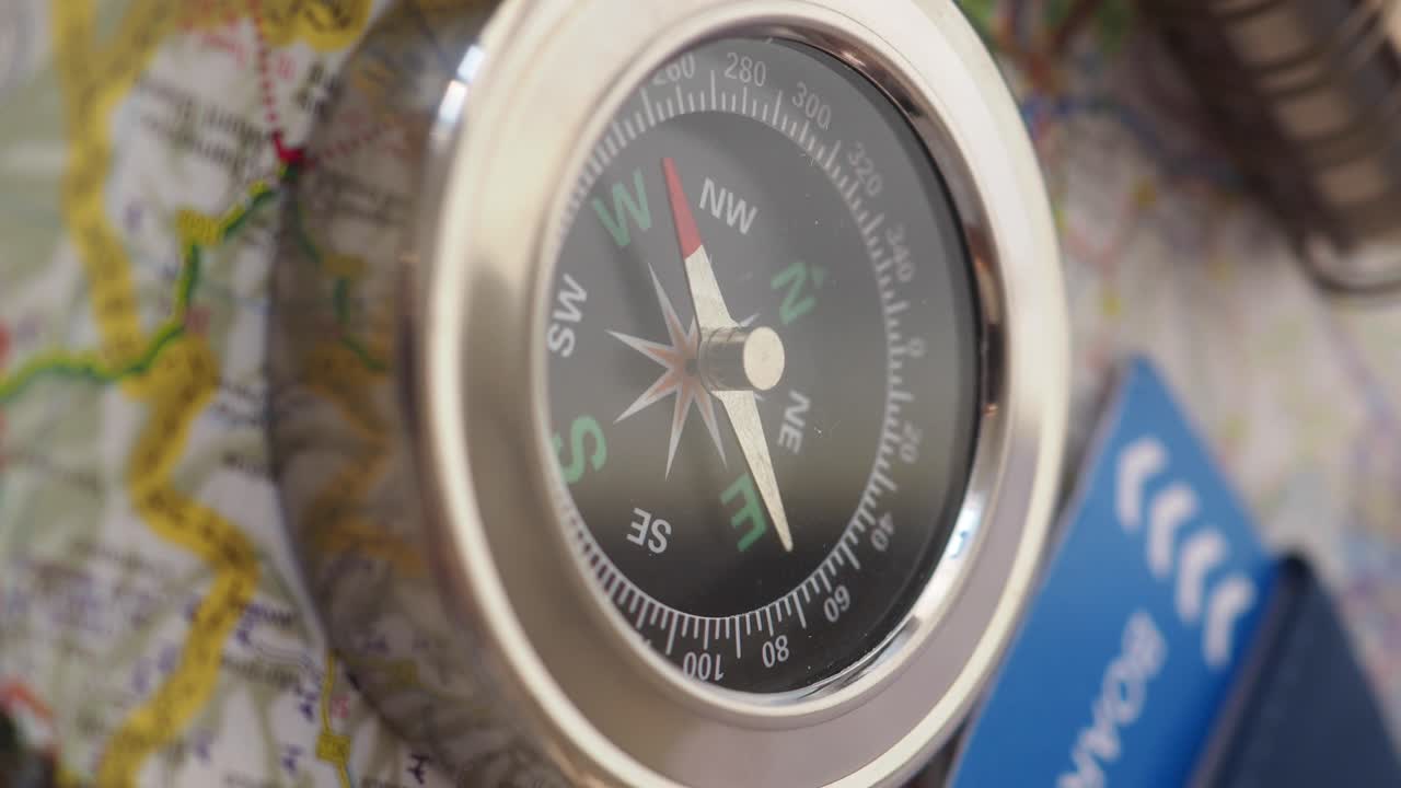 Compass on a map for travel and navigation