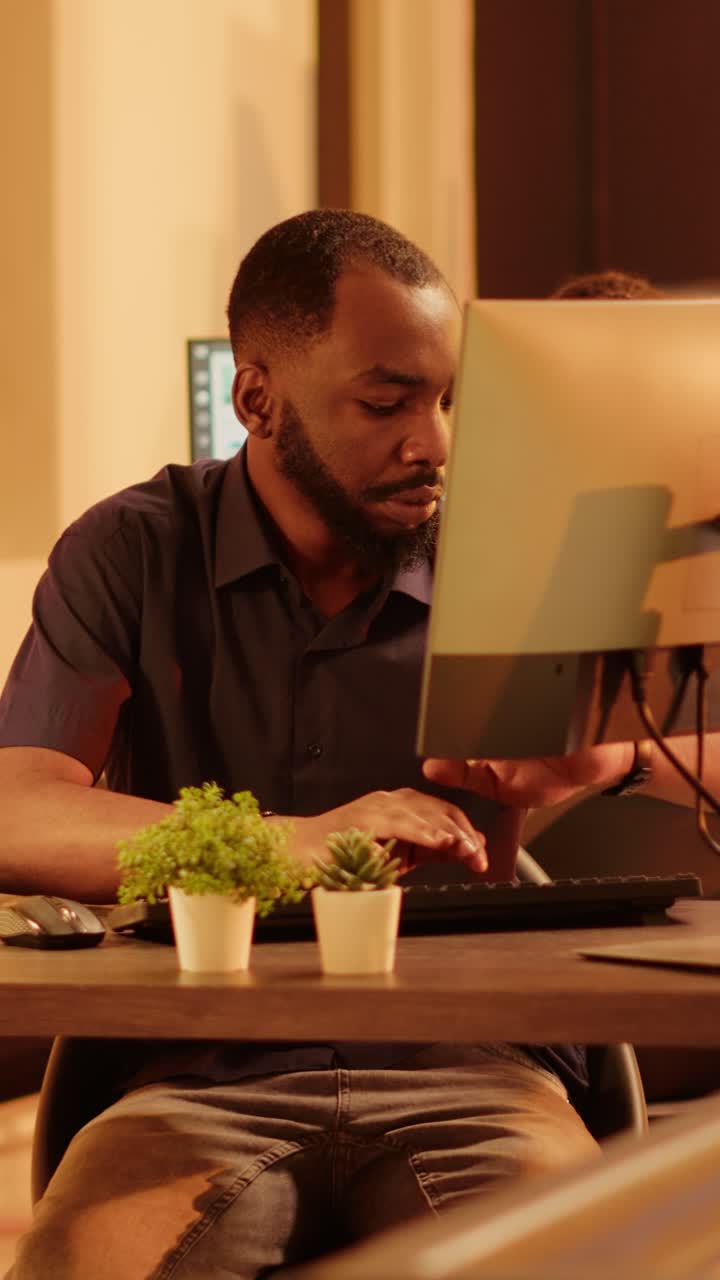 Man working on computer at desk