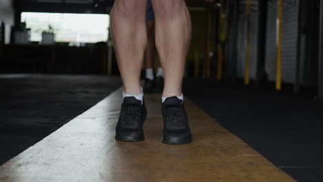 man jumping rope in gym