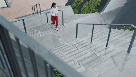 fitness, challenge and woman running on stairs