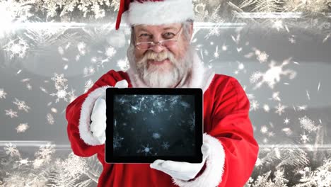 Santa-using-tablet-with-snowflakes