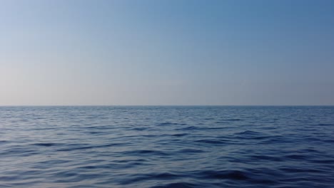 looking at the sea horizon while moving in a ferry off the coast of italy - pov