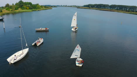 aerial shot of yachts and boats on the river