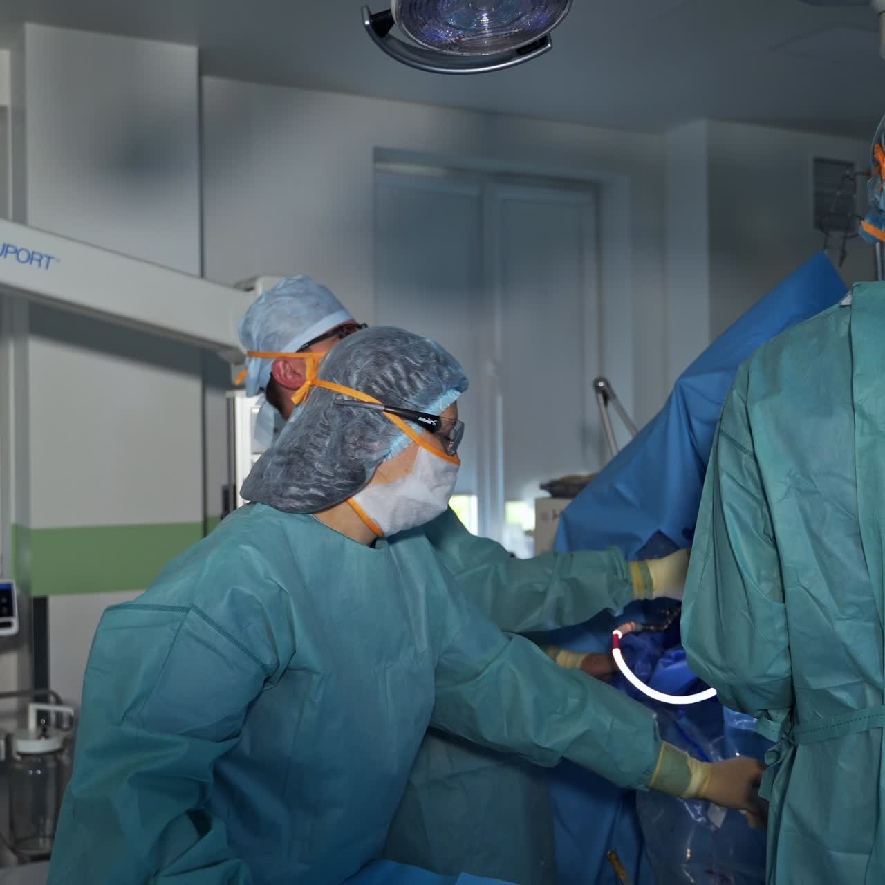 Medical professional surgeon teamwork. Surgery doctors operating in modern hospital room