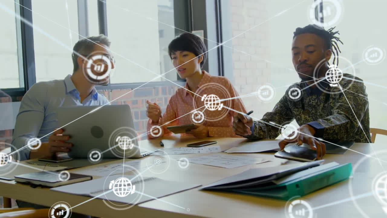 Animation of network of connections with icons over diverse business people discussing work