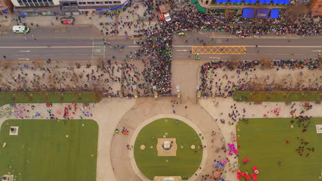 static aerial view of performers and spectators at belfast town hall during st. patrick’s day