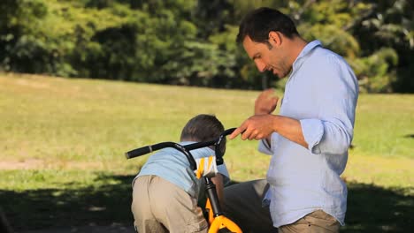 son taking the bike after the repairs