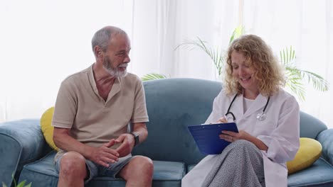 doctor consulting with elderly patient at home