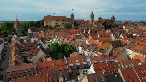 4k aerial drone video of the st. sebald church and the imperial castle in downtown nurnberg, germany