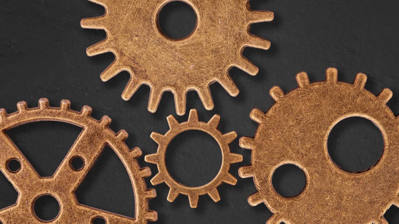 viejas ruedas de engranajes trabajando en armonía y cooperación