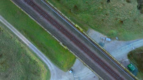 Railway-tracks-on-top-of-bridge-with-top-down-view-and-rotation-upwards