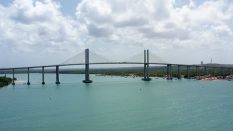 aerial drone shot of the newton navarro bridge, one of the biggest cable-stayed bridges in brazil