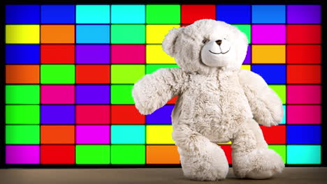 teddy bear dancing in front of colorful disco lights