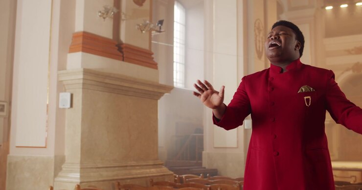 Male Singer Performing in a Church