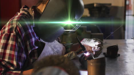 female welder welding metal workpiece in industrial workshop, with animated arc graphics