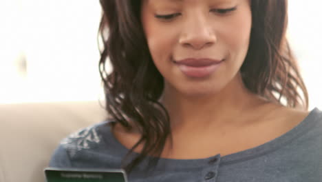 woman using her phone to shop